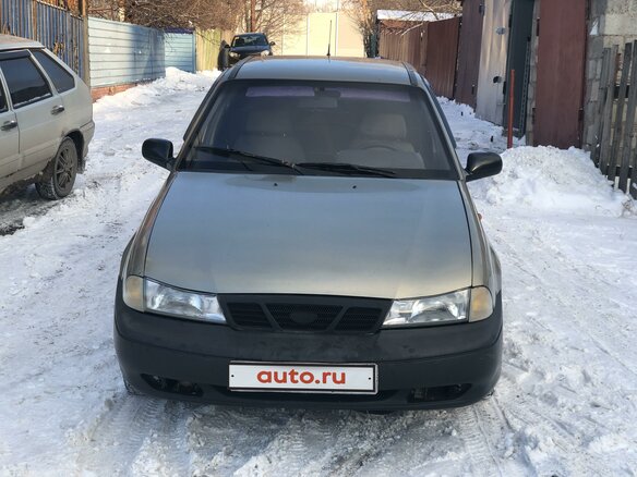 2006 Daewoo Nexia I, бежевый - вид 1
