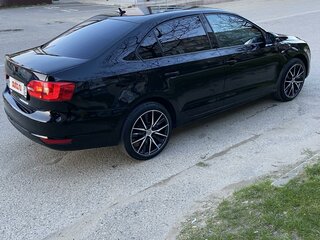 2012 Volkswagen Jetta VI, чёрный, 950000 рублей, вид 4