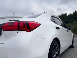 2014 Toyota Corolla XI (E160, E170, E180), белый, 1000000 рублей, вид 3