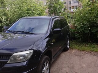 2004 Mitsubishi Airtrek Sport Gear I Рестайлинг, чёрный, 650000 рублей, вид 1
