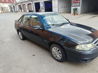 2012 Daewoo Nexia I Рестайлинг, чёрный, 150000 рублей, вид 1