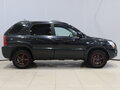 2009 Kia Sportage II Рестайлинг, чёрный - вид 2