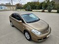 2008 Nissan Tiida I, бежевый, 869900 рублей