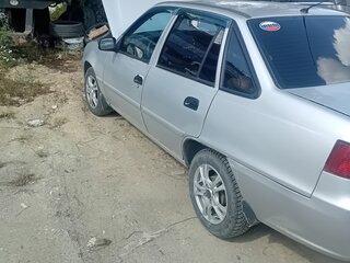 2012 Daewoo Nexia I Рестайлинг, серебристый, 180000 рублей, вид 5