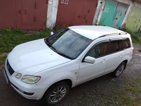 2002 Mitsubishi Airtrek I, белый, 620000 рублей, вид 1