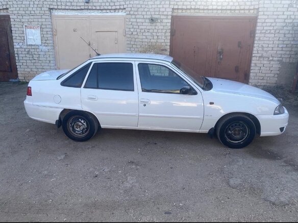 2009 Daewoo Nexia I Рестайлинг, белый, 215000 рублей - вид 7