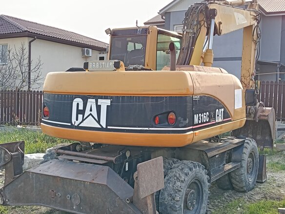 2006 Caterpillar M316, жёлтый, 6700000 рублей - вид 3