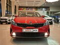 2021 Kia Rio IV Рестайлинг, красный - вид 2