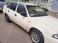 2010 Daewoo Nexia I Рестайлинг, бежевый, 180000 рублей - вид 1