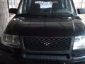 2010 УАЗ Патриот 31631 I, чёрный - вид 1