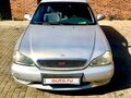 1999 Kia Clarus II, серый, 430000 рублей