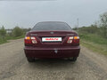 2001 Nissan Sunny N16, красный, 330000 рублей - вид 5