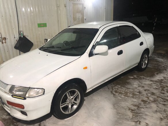 1996 Mazda Familia VII (BH), белый - вид 1