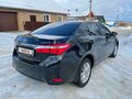 2013 Toyota Corolla XI (E160, E170, E180), чёрный - вид 3