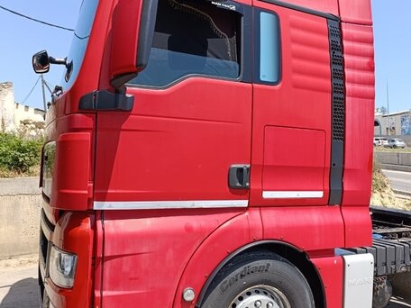 2011 MAN TGX, красный, 3500000 рублей, вид 5