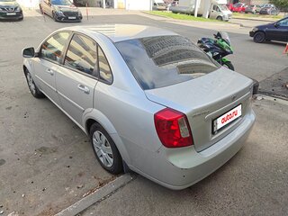 2014 Daewoo Gentra II, серебристый, 555000 рублей, вид 4