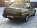 2006 Daewoo Nexia I, бежевый - вид 4