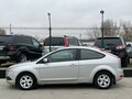 2009 Ford Focus II Рестайлинг, серебристый - вид 1