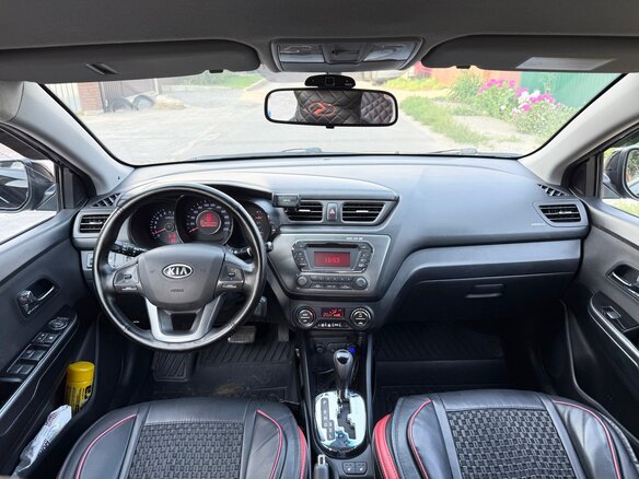 2012 Kia Rio 4-speed III, чёрный - вид 8