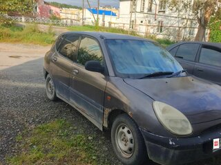 1998 Daihatsu Storia I (M100), серый, 100000 рублей, вид 2