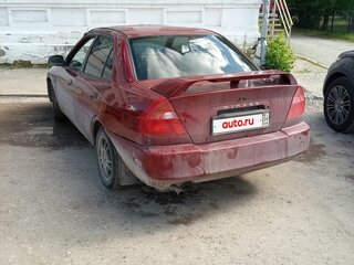 1998 Mitsubishi Mirage V, пурпурный, 130000 рублей, вид 3