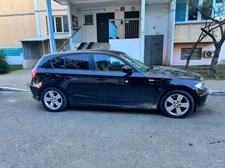 2010 BMW 1 серии 116i I (E81/E82/E87/E88) Рестайлинг, чёрный, 795000 рублей, вид 2