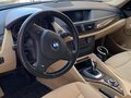 2011 BMW X1 20i I (E84), коричневый, 1850000 рублей - вид 4