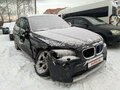 2010 BMW X1 20d I (E84), чёрный - вид 2