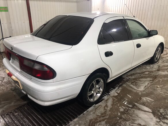 1996 Mazda Familia VII (BH), белый - вид 3