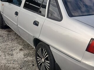 2011 Daewoo Nexia I Рестайлинг, серебристый, 210000 рублей, вид 5