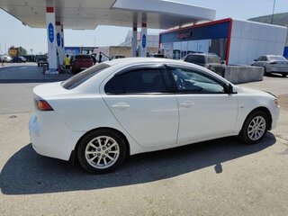 2014 Mitsubishi Lancer X Рестайлинг, белый, 650000 рублей, вид 4