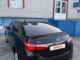2014 Toyota Corolla XI (E160, E170, E180), чёрный, 880000 рублей, вид 2