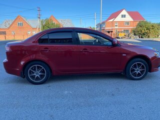 2011 Mitsubishi Lancer X Рестайлинг, красный, 659000 рублей, вид 3
