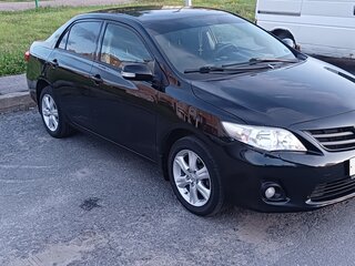 2010 Toyota Corolla X (E140, E150), чёрный, 955000 рублей, вид 2