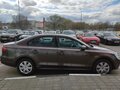 2015 Volkswagen Jetta VI Рестайлинг, коричневый - вид 3