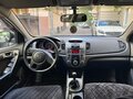 2010 Kia Cerato 5-speed II, пурпурный, 600000 рублей - вид 6