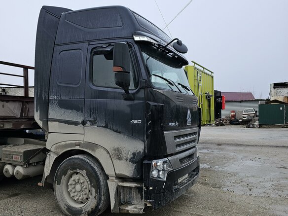 2011 Sinotruk Howo 6X4, чёрный, 2500000 рублей - вид 3