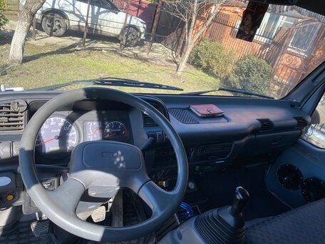 2010 Isuzu Elf (N-series), белый, 2250000 рублей, вид 4