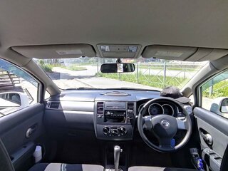 2009 Nissan Tiida I, белый, 610000 рублей, вид 2