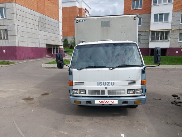 1992 Isuzu Elf (N-series), белый, 650000 рублей - вид 6