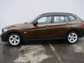 2011 BMW X1 18i I (E84), коричневый - вид 7