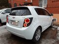 2013 Chevrolet Aveo II, белый - вид 2