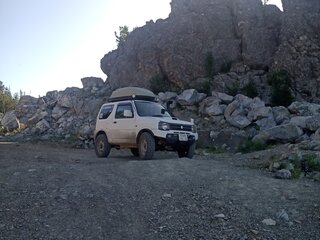 2010 Suzuki Jimny Kei car III Рестайлинг 1, белый, 900000 рублей, вид 4