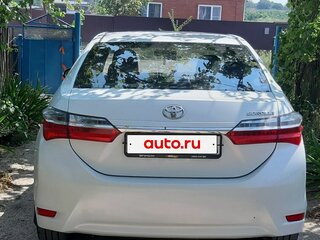 2016 Toyota Corolla XI (E160, E170, E180) Рестайлинг 1, белый, 1570000 рублей, вид 3
