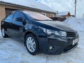 2013 Toyota Corolla XI (E160, E170, E180), чёрный - вид 2