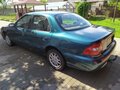 1999 Kia Clarus II, зелёный, 104437 рублей - вид 4