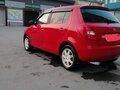 2011 Skoda Fabia II Рестайлинг, красный, 470000 рублей - вид 4