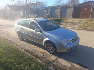 2010 Chevrolet Lacetti I, серебристый, 595000 рублей, вид 2