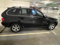 2004 BMW X5 4.4i I (E53) Рестайлинг, чёрный - вид 2