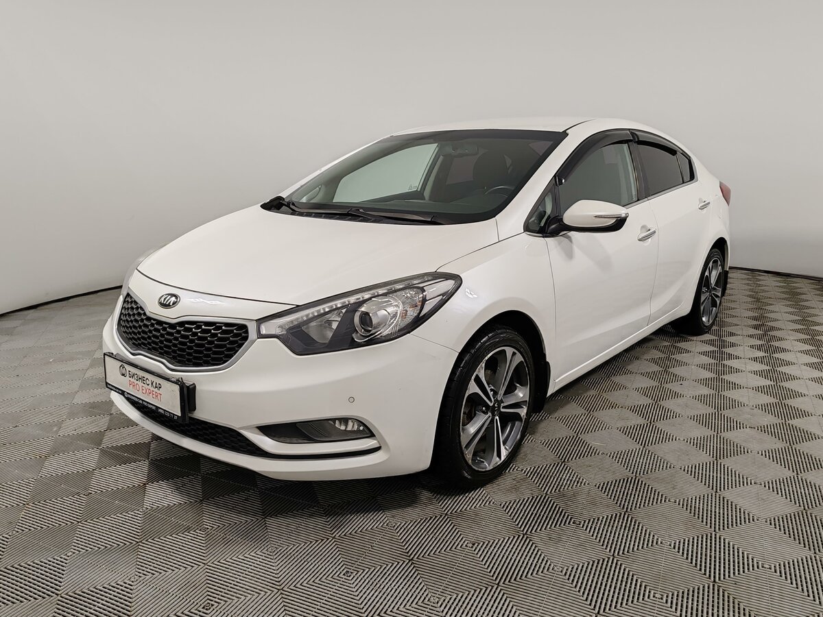 Открыть фотографии: Kia Cerato III